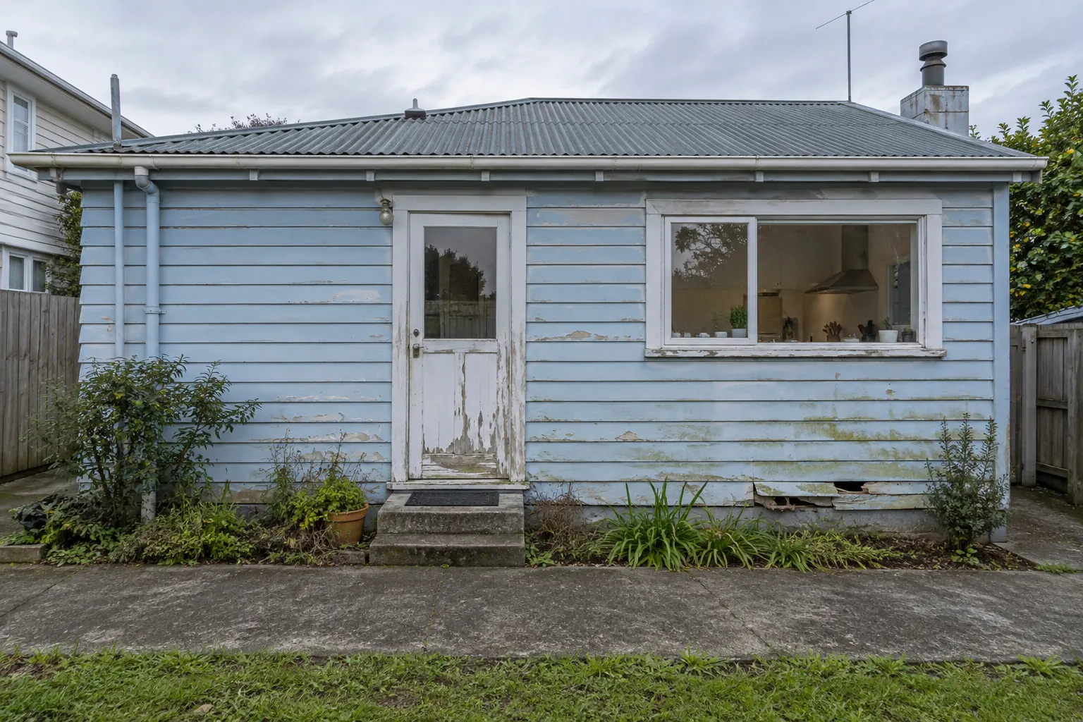 Exterior cladding before renovation