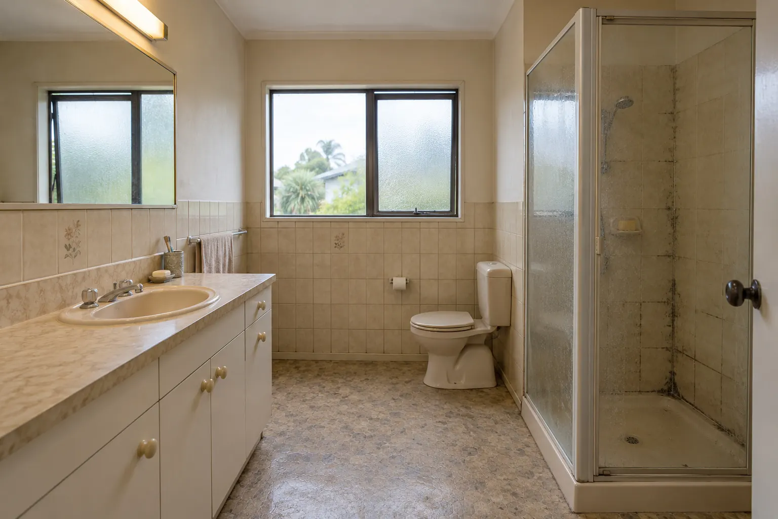 Outdated bathroom before renovation